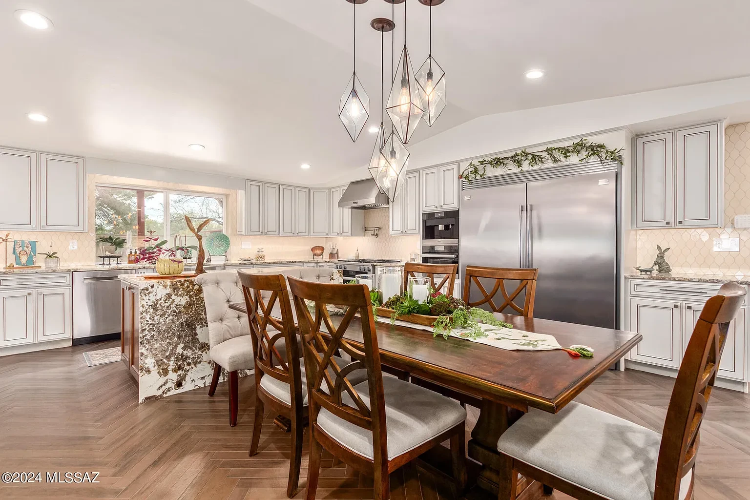 Waverly kitchen and dining area with custom island and pendant lighting