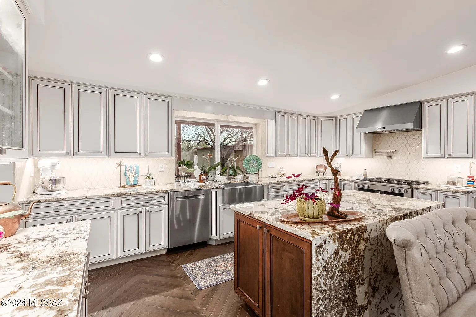 Waverly kitchen with custom cabinetry and marble island